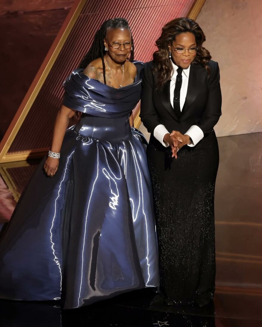 Two women Whoopi Goldberg and Oprah Winfrey standing on stage in elegant gowns, spotlight highlighting details, related to Oscars 2026 event timing and updates. Two women Whoopi Goldberg and Oprah Winfrey standing on stage in elegant gowns, spotlight highlighting details, related to Oscars 2026 event timing and updates.