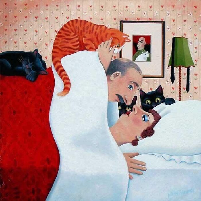 Surreal cat-themed artwork showing a man and woman in bed surrounded by black and orange cats in a cozy room.
