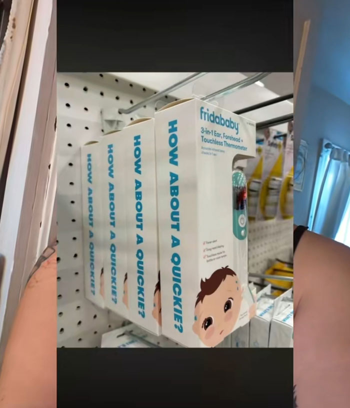 Frida Mom product packaging on store shelf showing thermometer with questionable marketing phrase causing online chaos.