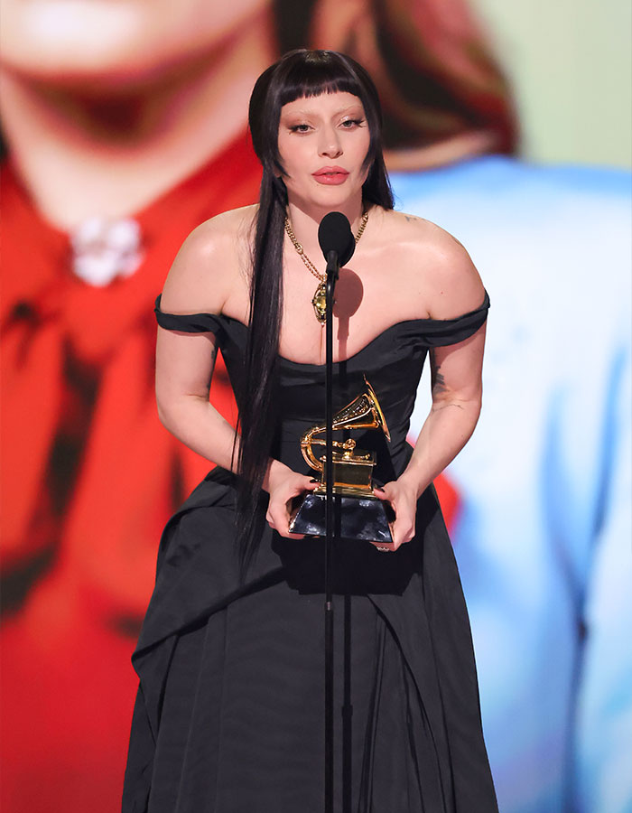 Lady Gaga holding Grammy award on stage amid Grammy performance and Epstein ties chatter as new files are released