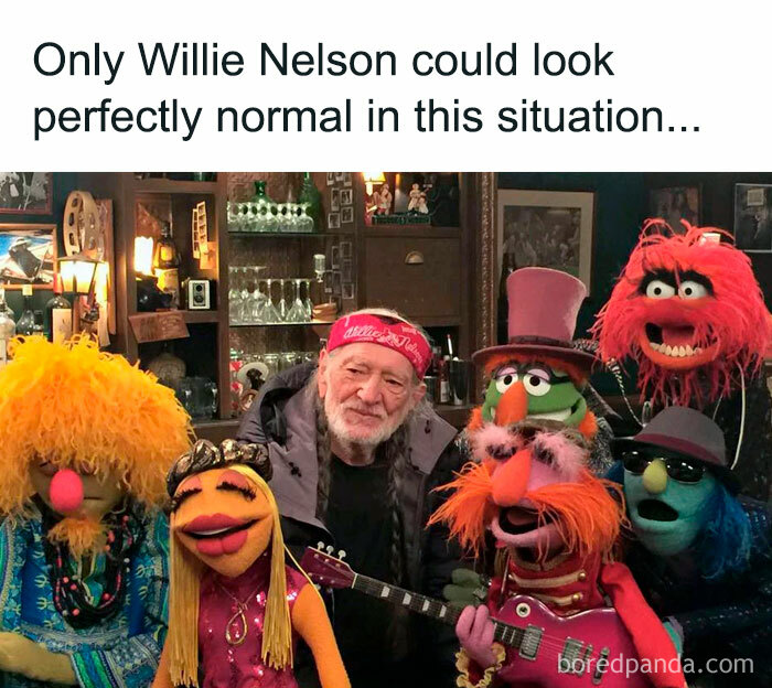 Willie Nelson surrounded by nostalgic Muppet characters in a colorful, cozy bar setting with musical instruments.