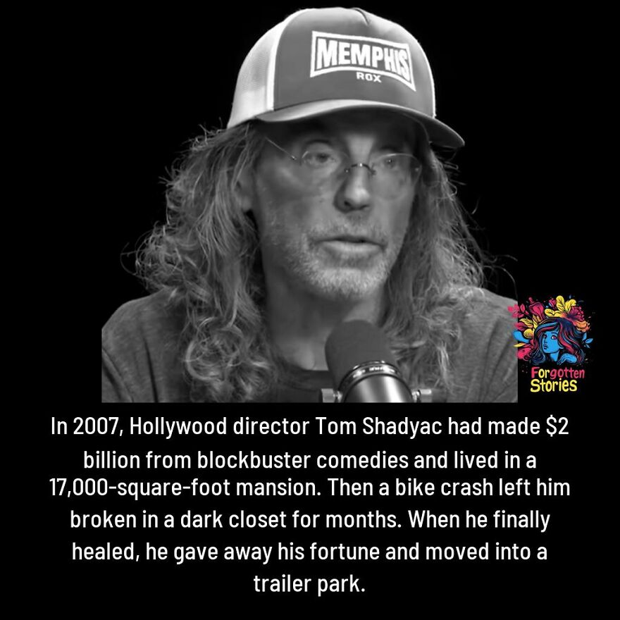 Man with long hair and glasses speaking into a microphone in a video about forgotten stories that need more attention.