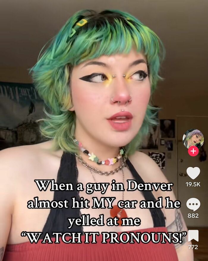 Young woman with green hair and bold makeup sharing a cynical moment, perfect for hilarious memes with a hint of cynicism.