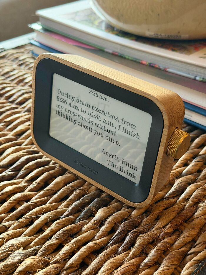 A unique wooden digital clock displaying a quote, found as a jackpot at the thrift store.
