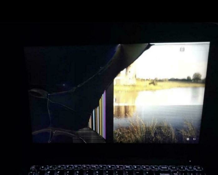 Laptop screen c*****d and distorted, illustrating boomer technology fails and difficulties using modern devices.