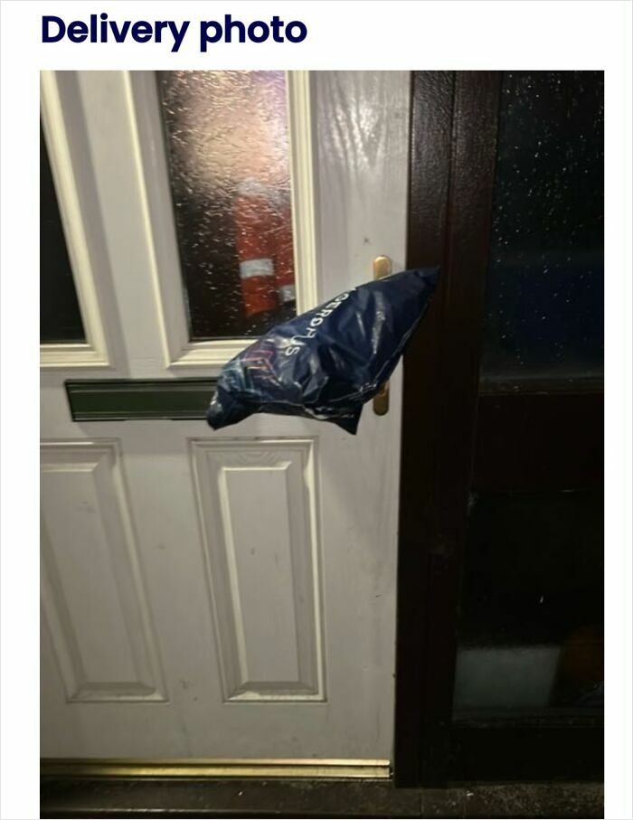 Package humorously stuck on front door handle as delivery confirmation in hilarious driver photo example.