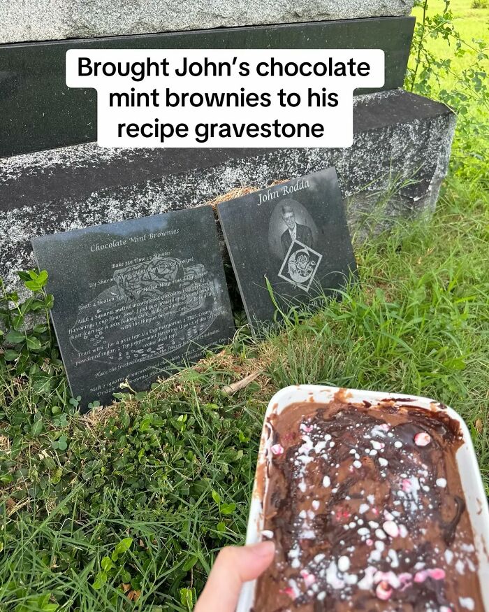 Chocolate mint brownie recipe etched on a tombstone with a woman holding freshly baked brownies nearby in grass.