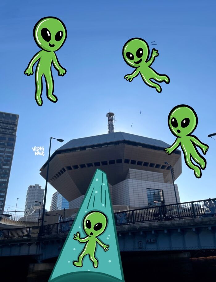 Cartoon aliens added to a cityscape turning everyday urban scene into a playful little cartoon scene.