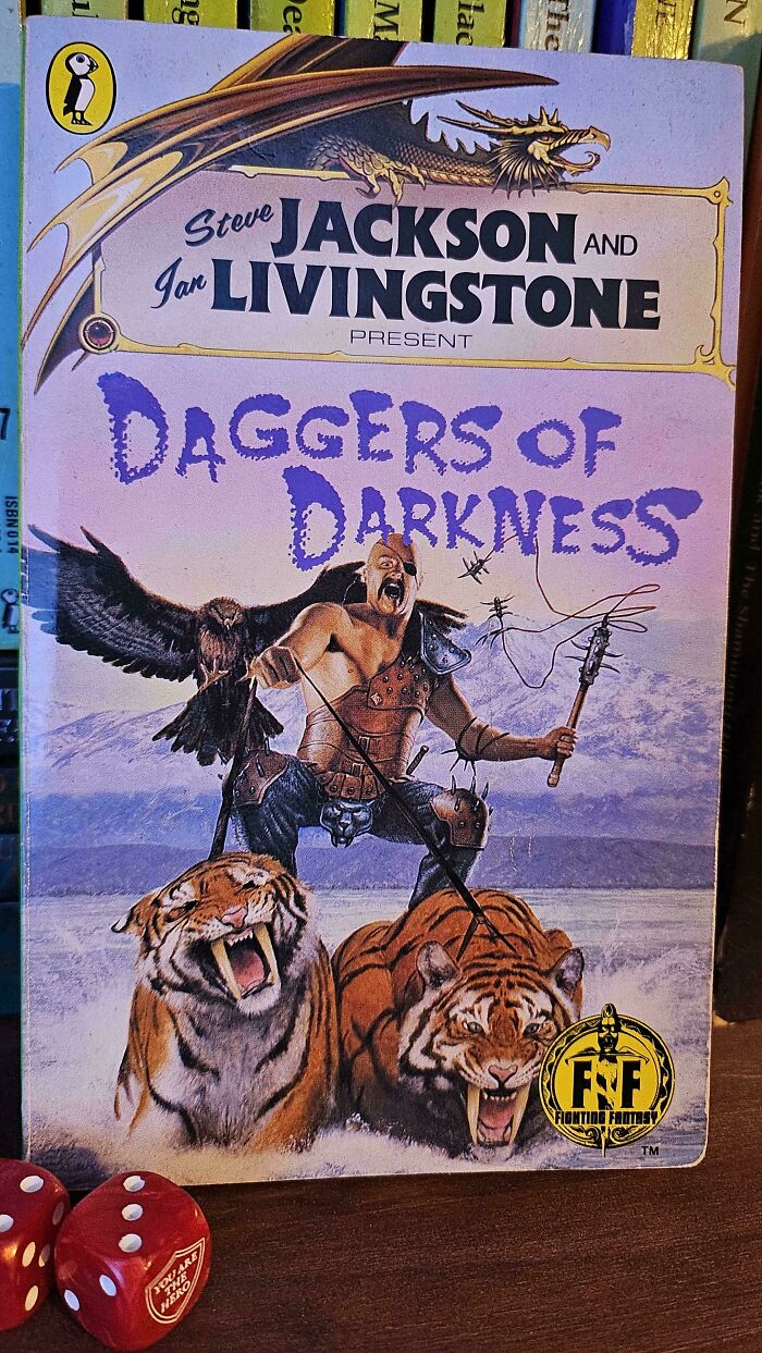 Book cover featuring a warrior with two tigers and a large bird, illustrating one of the terrible book covers to judge.