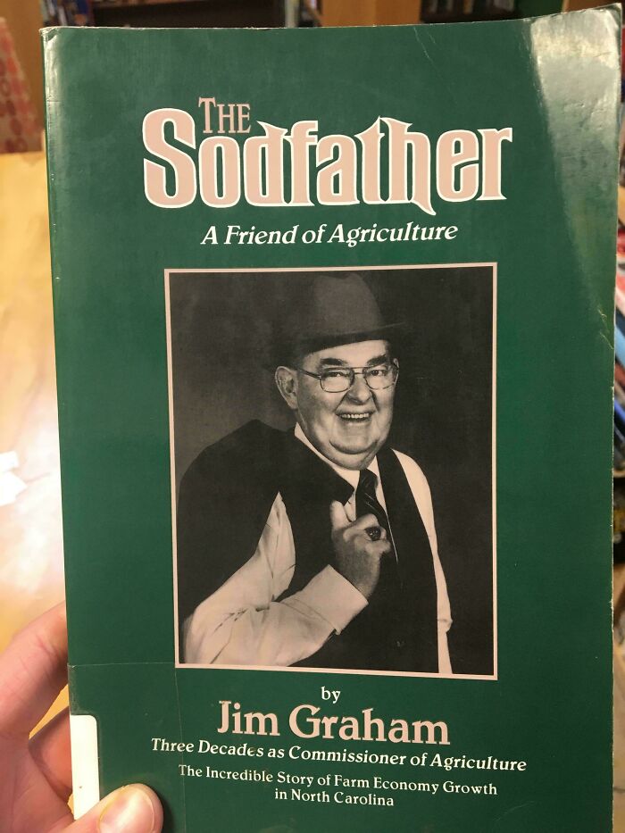 Book cover titled The Sodfather featuring a man in a hat and glasses, an example of a terrible book cover design.