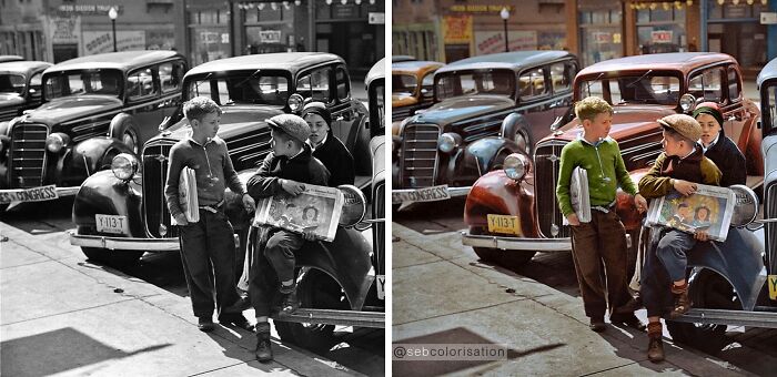 Two boys talking near classic cars on a street, colorized to showcase stunning works by Sébastien De Oliveira.