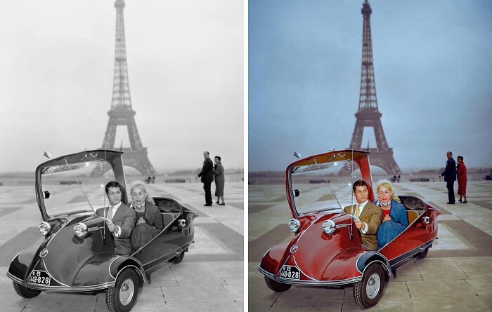 Black and white photo colorized by Sébastien De Oliveira showing a vintage car with a couple near the Eiffel Tower.