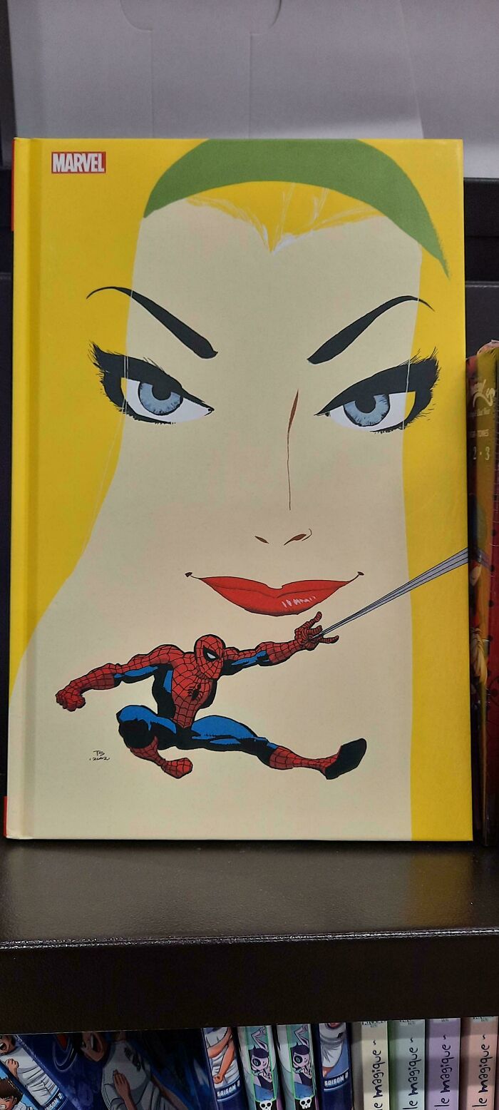 A comic book cover with Spider-Man swinging from a woman's mouth, a hilariously unhinged design fail.
