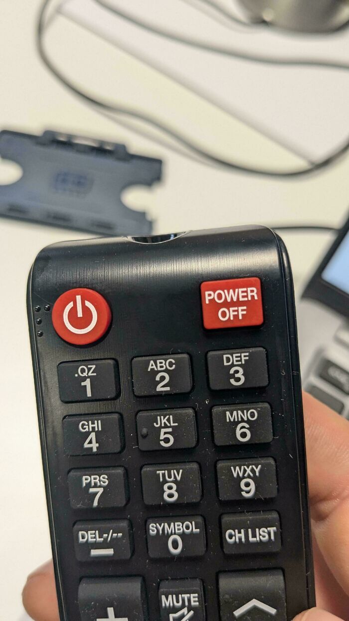 A TV remote with two power off buttons, a hilariously unhinged design fail.