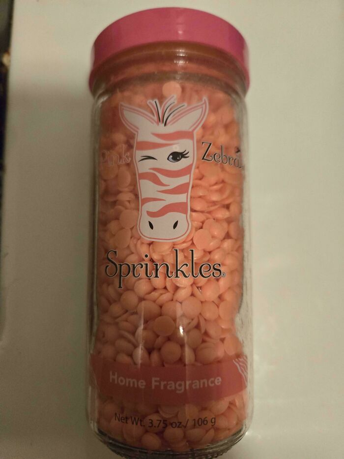 A jar of Pink Zebra Sprinkles for home fragrance, a design fail due to its resemblance to actual sprinkles.