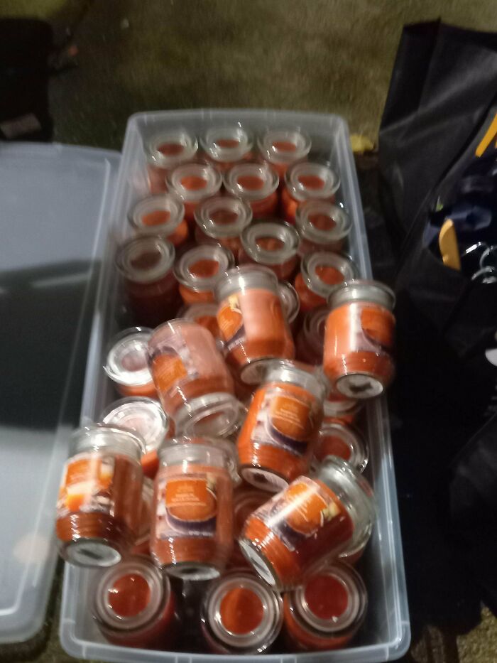 A large bin full of identical candles, a lucky dumpster diving find.