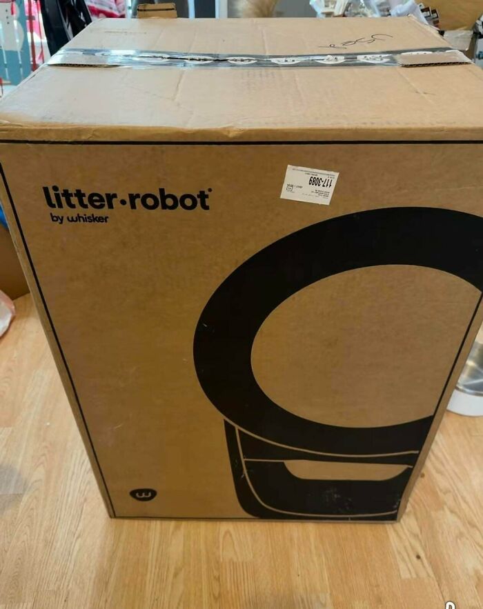 A large Litter-Robot box, a valuable find from dumpster diving, ready for a new home.
