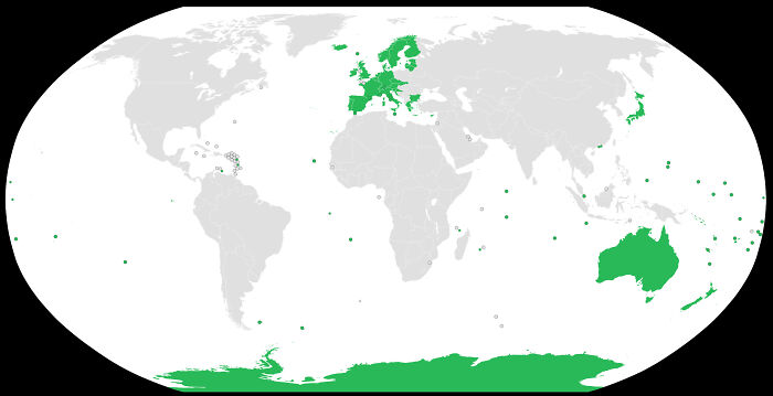 A unique map of the world showing specific regions highlighted in green, ideal for geography class