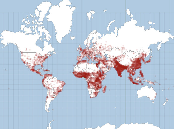 World map with red dots depicting population density or global data, representing interesting maps.