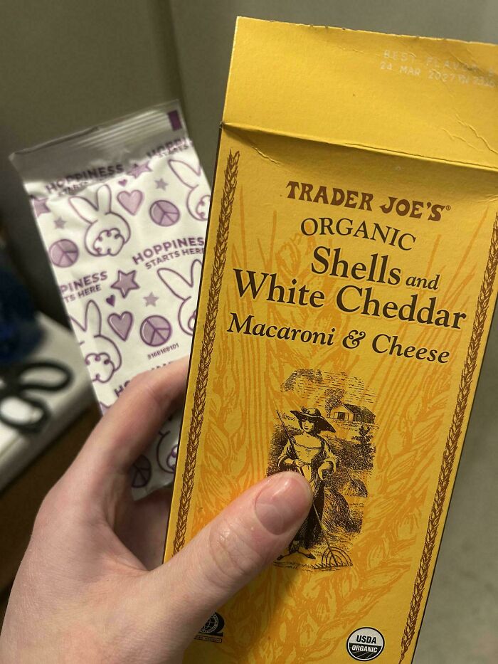 Mildly interesting picture showing a box of Trader Joe's organic macaroni and cheese alongside a bunny-themed bag.
