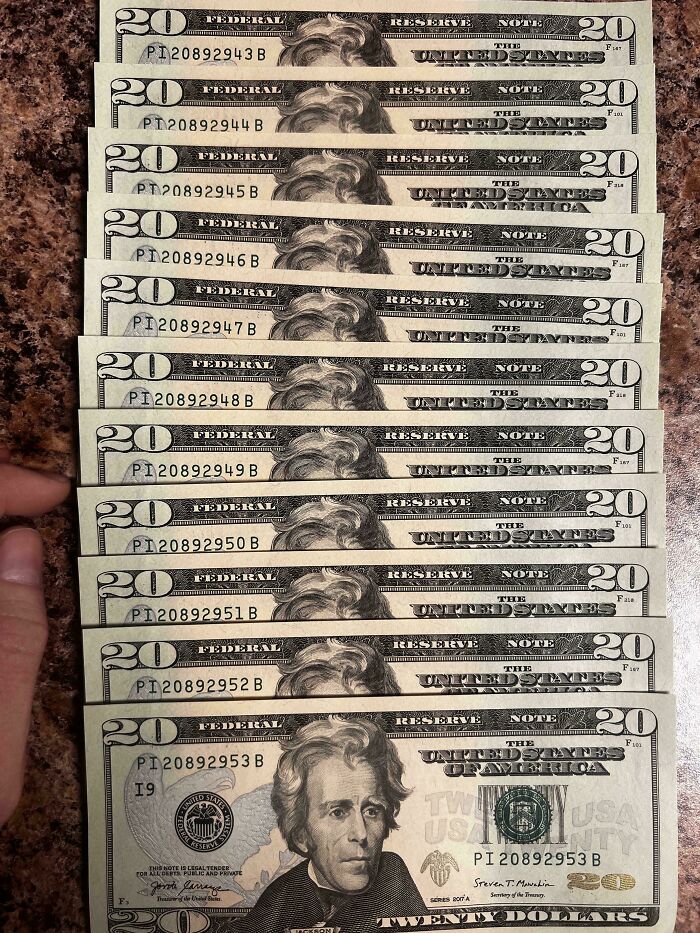 A stack of twenty-dollar bills with consecutive serial numbers, a mildly interesting picture.