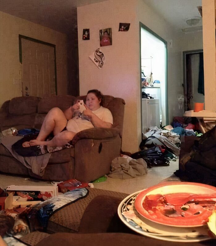 Person lounging on a couch surrounded by clutter, illustrating extreme laziness from the lazy people collection.
