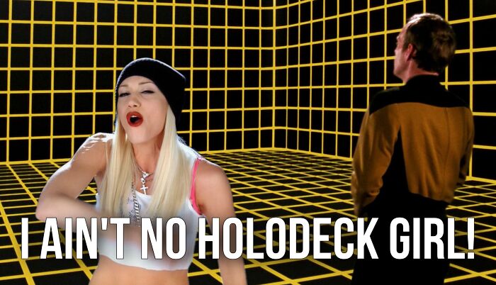 A woman in a beanie and crop top raps in a grid-patterned sci-fi room with text referencing a holodeck meme.