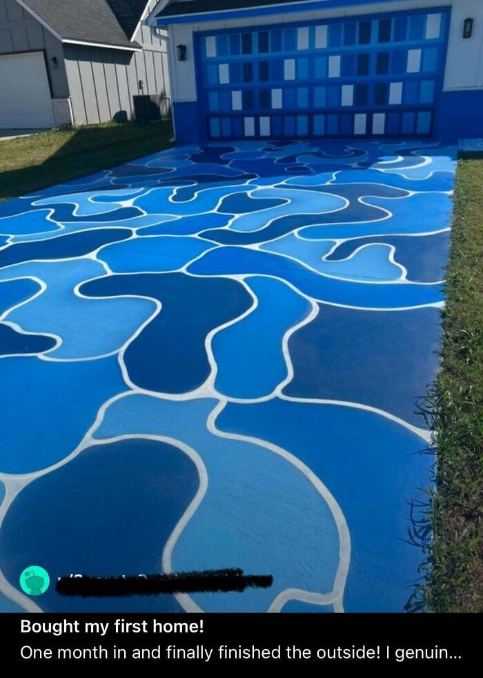 Driveway and garage door painted with abstract blue patterns as part of ridiculous home decor and DIY projects.