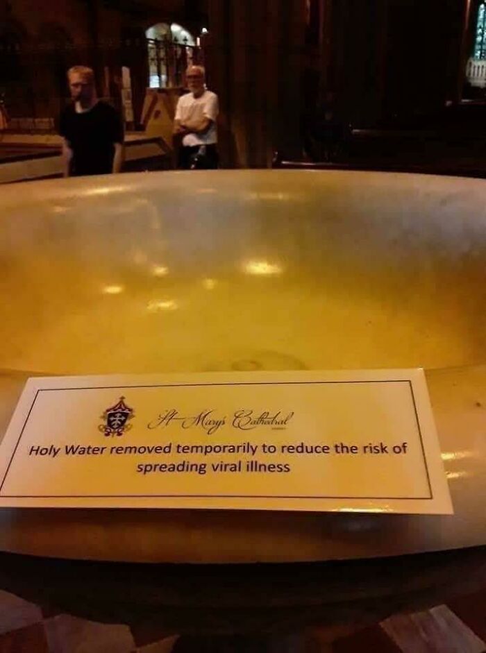 Holy water removed sign at St Marys Cathedral as one of the scariest signs spotted in the wild warning of viral illness risk.