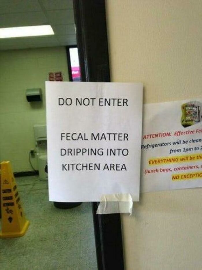 Warning sign posted about fecal matter dripping into kitchen area, one of the scariest signs spotted in the wild.