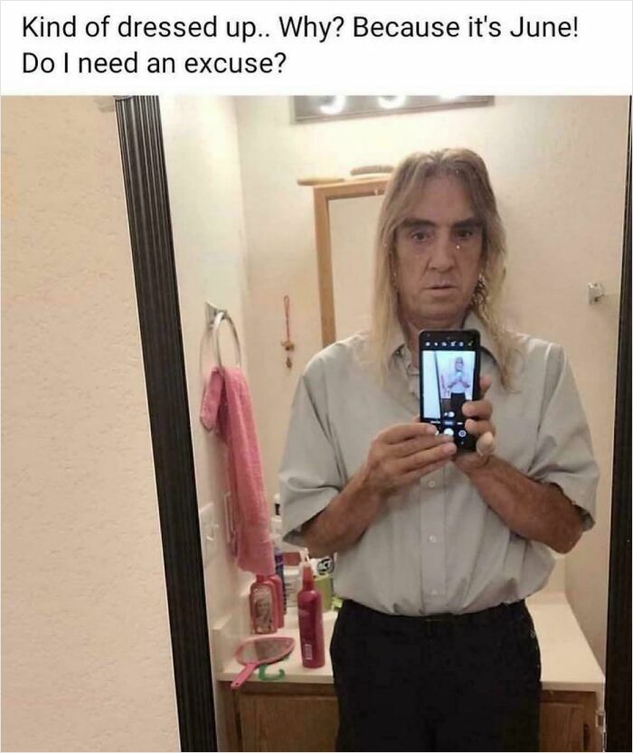 Man awkwardly dressed taking a mirror selfie with a phone, illustrating boomers struggling to use technology humorously.