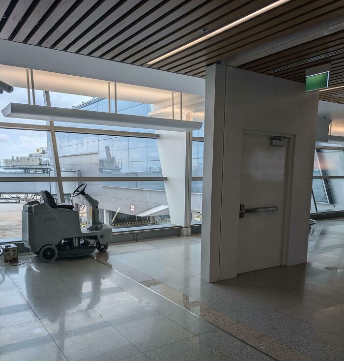 A door that leads nowhere in a modern building, showcasing an architects fail in design and function.