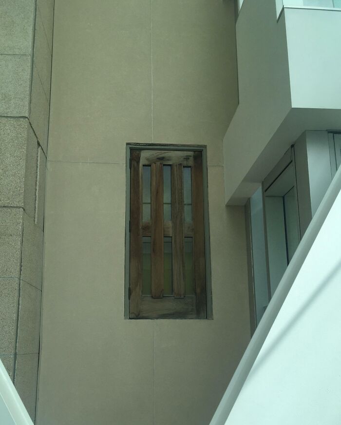 Door that leads nowhere built into a wall, showing a clear example of architects failing at their jobs.