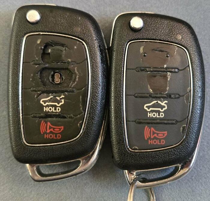 Two worn car key fobs side by side showing partners’ most frustrating habits causing damage over time.