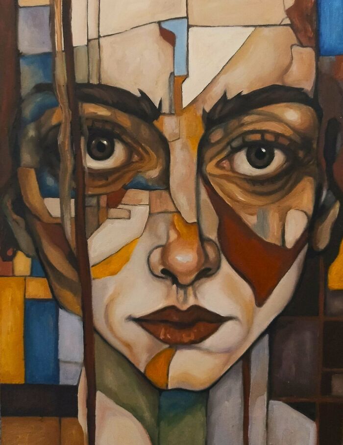 Abstract portrait painting of a face featuring geometric shapes and warm tones, representing DIY wins and healing.