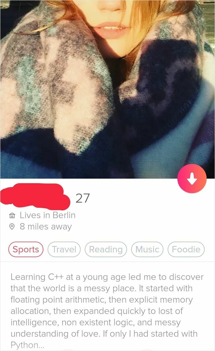 Close-up of a Tinder profile showing a woman wrapped in a blanket with a quirky, off-the-rails bio.