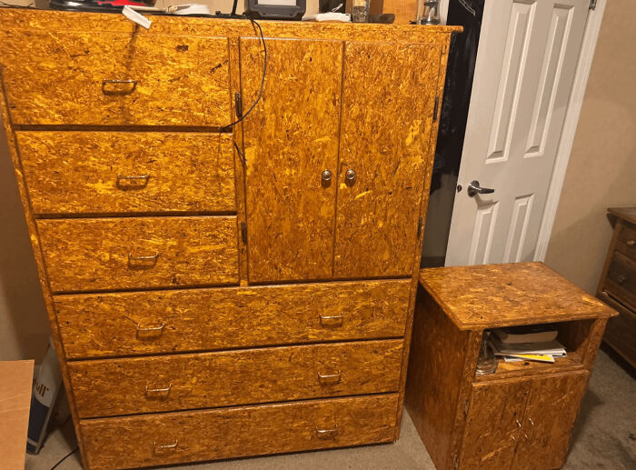 DIY project furniture made from rough, unfinished particle board with uneven texture in a bedroom setting
