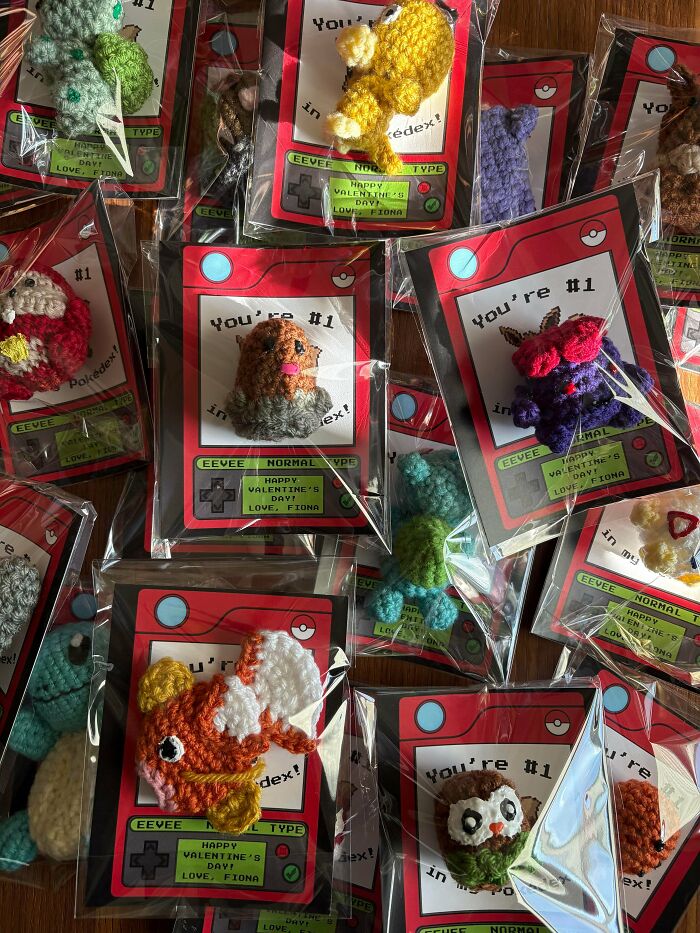 Crocheted Pokémon-themed pins packaged with custom Valentine’s Day cards, showcasing DIY wins and creative handmade crafts.