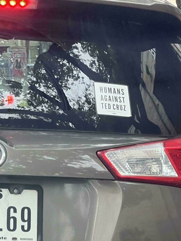SUV rear window bumper sticker protesting against Ted Cruz