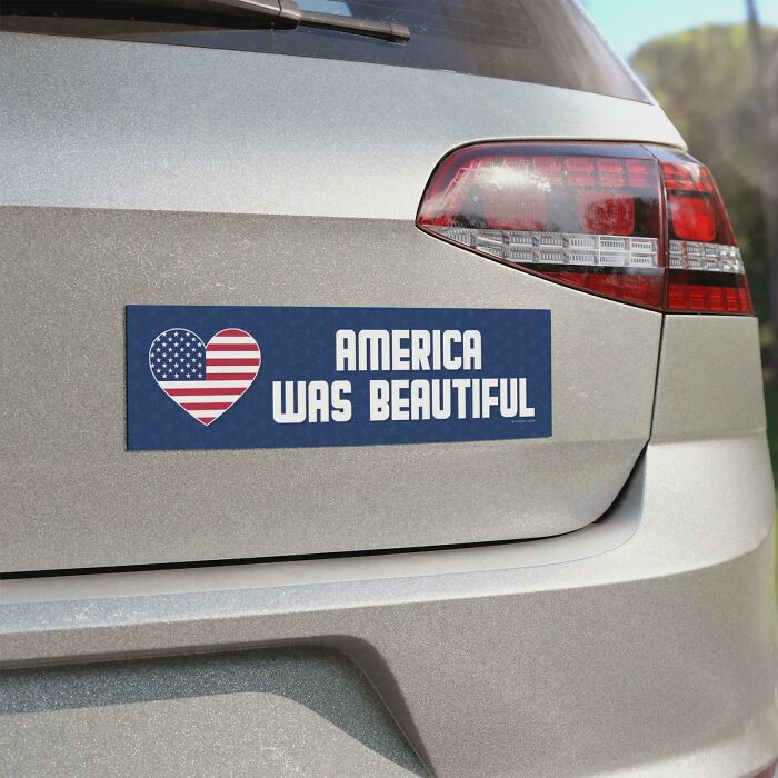 Bumper sticker stating America was beautiful with a heart-shaped American flag design