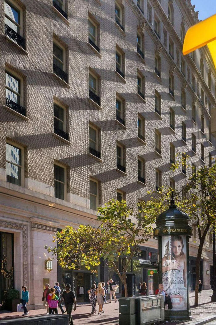 Building facade in San Francisco casting confusing geometric shadows that create a misleading and glitch-like visual effect.