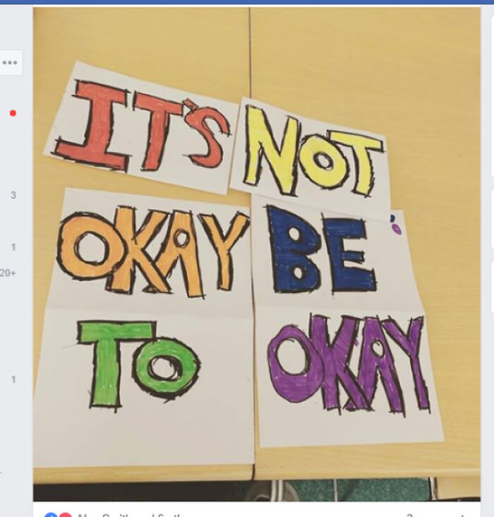 Colorful handwritten sign reading its not okay to be okay, an example of signs that went wrong and turned comedic gold.