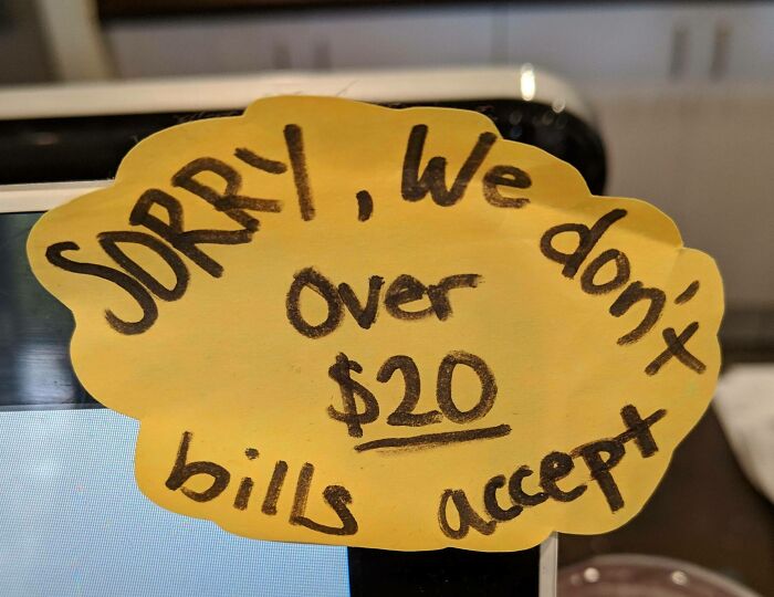 Funny sign saying sorry no bills over 20 accepted, a comedic gold example of signs that went so wrong.