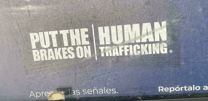 Sign with a humorous error saying Put the brakes on human trafficking, highlighting signs that went wrong for comedic effect