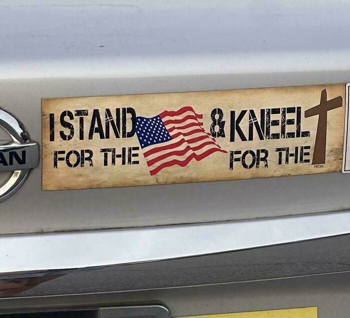 Bumper sticker sign with a flag and cross that humorously went wrong among signs that turned into comedic gold.