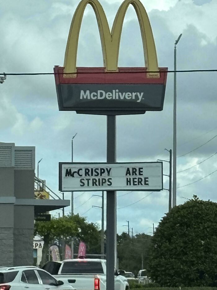 McDonalds sign with scrambled letters spelling crispy strips, an example of signs that went wrong and turned comedic gold.