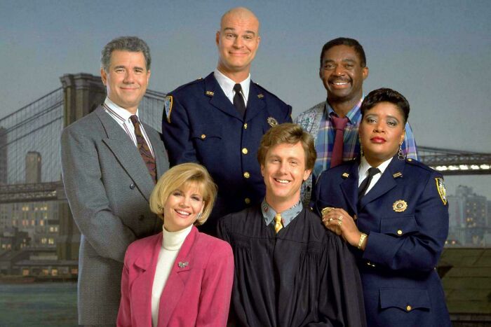 Cast of Night Court, featuring six actors in various roles, an image that might take you way back to classic TV.