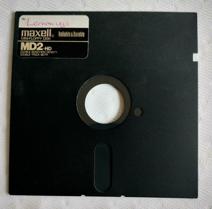 A black Maxell mini-floppy disk, an iconic image that will remind you how old you are.
