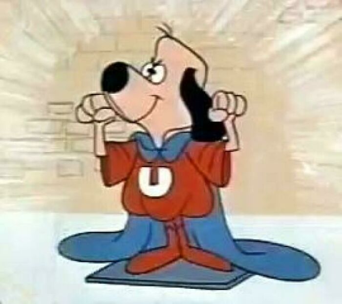 A cartoon dog in a superhero costume, an image that might take you way back to your childhood.