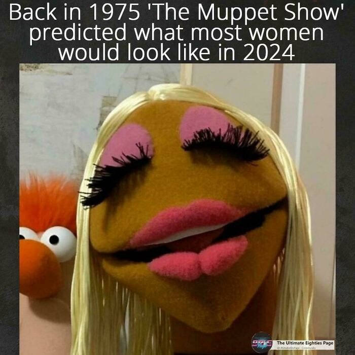 A Muppet Show character with exaggerated makeup and blonde hair reminds you how old you are.